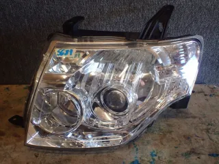  Фара левая Mitsubishi Pajero 4 Арт e1239661, вид 1