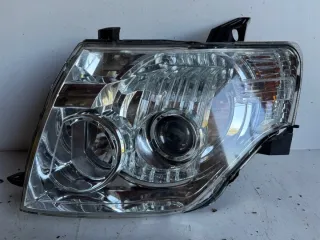 100-67018 Фара левая Mitsubishi Pajero 4 Арт e12521704, вид 1