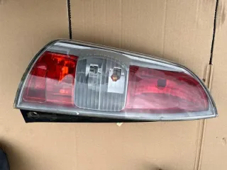 2005-2014 Фонарь задний левый Daihatsu Sirion Арт e11810660, вид 1