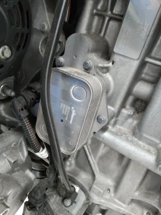 9815697880 Теплообменник масляного фильтра Peugeot 208 2 1.2л Арт 94520, вид 1