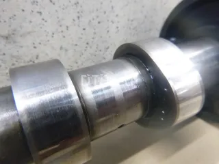 1300100Q0H Распредвал выпускной Nissan Qashqai 1  Арт AM100156044, вид 3