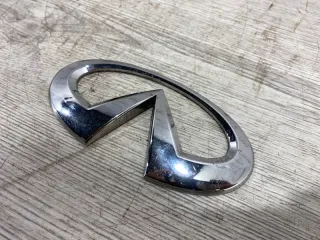 934911LA0A Эмблема крышки багажника Infiniti QX56 2 Арт 2-485497, вид 4